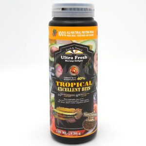 A container of Ultra Fresh Shrimp Delight Tropical Excellent Bits fish food, featuring colorful images of fish and shrimp, and text highlighting 40% shrimp content and 100% all-natural protein.