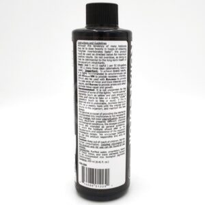 A black plastic bottle with a black cap, featuring a white label covered in small, dense black text. The label provides instructions and guidelines for using the product. The bottle stands upright against a white background.