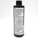 A black bottle of Brightwell Aquatics aquarium supplement with a white label containing detailed product information in small black text, including usage instructions and company details. The bottle has a black cap.