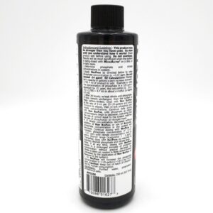 Black bottle with a black cap, featuring a detailed label of white text containing instructions, guidelines, and product information. The text is small and densely packed, making it difficult to read in this image.