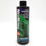 A 250 ml bottle of Brightwell Aquatics NeoNitro, a nitrogen supplement for reef aquariums. The label is black with green coral imagery and white and blue text describing its use for nitrogen-limited, low-nutrient reef aquaria.