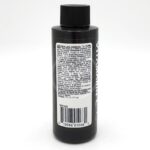 A black plastic bottle with a black cap features a white label containing directions and information in small text. The barcode and some product details are visible at the bottom of the label.