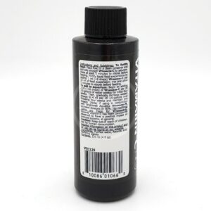A black plastic bottle with a black cap features a white label containing directions and information in small text. The barcode and some product details are visible at the bottom of the label.