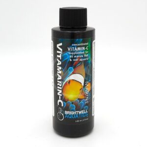 A black bottle labeled VitaMarin-C by Brightwell Aquatics, a concentrated vitamin C supplement for marine fish and reef aquaria. The label features a clownfish image and blue coral graphics.