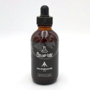 A brown glass dropper bottle labeled Polyp Lab Polyp-Booster 100mL with a black cap and dropper, designed for aquarium use, against a plain white background.