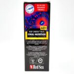 A box of Red Sea Reef Energy Plus AB+ Coral Nutrition supplement, featuring colorful coral imagery and text highlighting it as an all-in-one enhanced formula for coral growth and coloration.