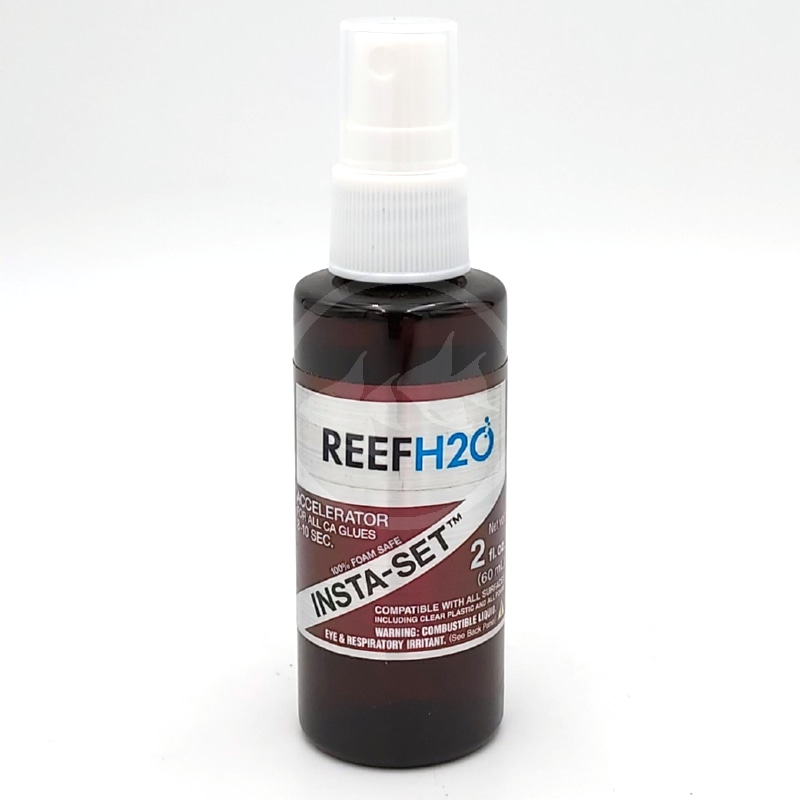 REEF H2O INSTA SET CA ACCELERATOR PUMP SPRAY 2 OZ FRONT.jpg A brown spray bottle labeled REEF H2O Insta-Set Accelerator for CA glues, 2 oz size, with a white spray cap and warning information printed on the lower part of the label.