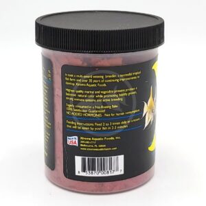 A container of Xtreme Aquatic Foods, partly showing the label with feeding instructions, product description, and a Made in USA symbol, along with a barcode and company contact details.