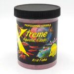 A container of Xtreme Aquatic Foods Krill Flake fish food with a black lid and colorful images of various fish on the label. The container reads Professional Formula and Krill Flake.