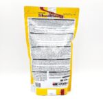A yellow and white resealable package of HIKARI SILKWORM SELECTS TREAT 17.6 OZ is shown from the back, featuring detailed product information, instructions, and branding in black and red text.
