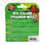 The back of a Zoo Med package for New Zealand Sphagnum Moss, featuring product information, usage instructions, and cleaning directions on a green background with images of a frog and moss.