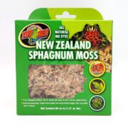 A green box of Zoo Med New Zealand Sphagnum Moss with a clear window showing the moss inside. The packaging features an image of a frog and text highlighting it as all natural and dye-free.
