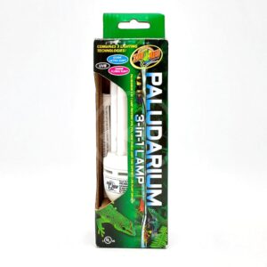 A green box labeled Paludarium 3-in-1 Lamp from Zoo Med is shown, featuring images of reptiles and plants. A portion of the white light bulb inside the packaging is visible through a cut-out window.