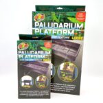 Two Zoo Med Paludarium Platform boxes, one small and one large, are standing upright. Both boxes show images of the platform product and before-and-after pictures of setup in a terrarium.