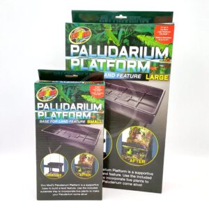 Two Zoo Med Paludarium Platform boxes, one small and one large, are standing upright. Both boxes show images of the platform product and before-and-after pictures of setup in a terrarium.