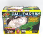 A box labeled Paludarium UVB & Plant Growth Lighting Kit featuring a green lizard, images of the lighting kit, included accessories, and bright colors with product details and brand logos.