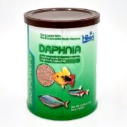 A can of HIKARI FREEZE DRIED DAPHNIA .42 OZ (12G) features three tropical fish on the label and highlights vitamin enrichment, a parasite- and bacteria-free formula.
