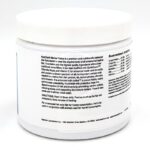 A white plastic jar of NutriDiet Marine Flakes fish food. The label displays product information, feeding directions, nutritional ingredients, and the manufacturers details in black text.
