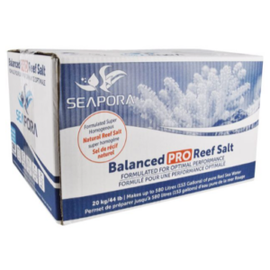 A white and blue Seapora box labeled Balanced PRO Reef Salt with coral imagery. Text highlights it is natural reef salt for making up to 580 liters (153 gallons) of reef sea water.