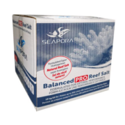 A white and blue box of Seapora Balanced Pro Reef Salt, featuring a coral reef image and red text highlighting “Natural Reef Salt.” The box is labeled for up to 300 liters (80 gallons) of aquarium water.