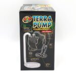Box of Zoo Med Terra Pump Aquatic Habitat Drain Pump, featuring an image of the pump, tubing, and labeled components, along with product name and description on a black background.