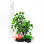 The PP BONSAI TREE GREEN 8 BST10 plastic aquarium plant, featuring green foliage with pink and green base plants, is shown beside a clear ruler for size reference on a white background.