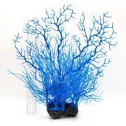 The UT SEA FAN BLUE features thin, branching bright blue coral stems upright on a black base. Displayed with a clear ruler for scale, it measures about 10 inches tall against a plain white background.
