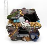 The PP RESIN TREASURE CHEST is a decorative aquarium ornament shaped like a moss-covered sunken chest adorned with coins, pearls, and jewelry, shown with a ruler in the background for scale.