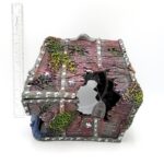 The PP RESIN TREASURE CHEST is a decorative, weathered resin ornament with large holes, moss, barnacles, and metallic studs. Shown next to a ruler on a white background, the chest measures about 8 inches tall.