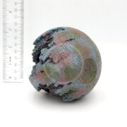 The UT RESIN SPACE BALL is a weathered, 9 cm model resembling the Death Star, shown with a ruler for scale. Its faded paint and partial damage make it look like an underwater treasure preserved in resin.