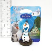 A PP RESIN FROZEN OLAF MINI FZR30 figurine stands before Frozen-themed packaging and a ruler, with a visible $6.99 price tag.