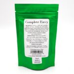 A green resealable pouch labeled Complete Envy featuring ingredients, instructions for feeding shrimp, and company details. A white sticker at the bottom displays the best before date as 02/2028.