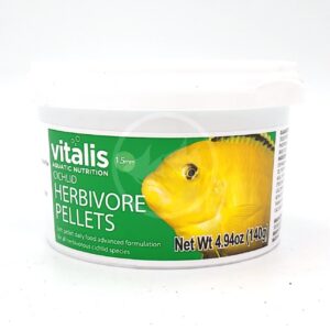 A white tub of Vitalis Cichlid Herbivore Pellets fish food, featuring a picture of a yellow fish and green label text indicating it is for herbivorous cichlid species. Net weight is 4.94 oz (140g).