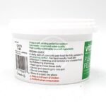 White plastic container of fish food pellets with green and white label showing feeding guide, directions, and warnings such as Keep out of reach of children and Not for human consumption. Text is clearly visible.