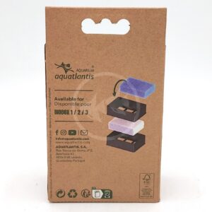 A brown cardboard package for Aquatlantis aquarium products, showing images of black filter boxes and purple and white filter pads. Product and company information are printed in multiple languages.