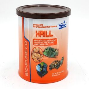 A container of HIKARI FREEZE DRIED KRILL with an orange label showing krill, a fish, a frog, and a turtle, highlighting added vitamins and suitability for various aquatic pets.