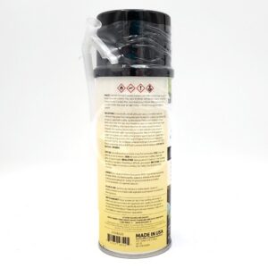 A cylindrical container with a black lid and a clear tube, wrapped in plastic. The label features warning symbols and instructions on a yellow background. Text includes MADE IN USA at the bottom.