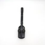 A black plastic vacuum cleaner attachment with bristles and two round rubber pads, displayed on a white background.