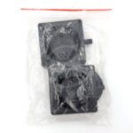 Two black plastic mechanical parts are packaged together in a transparent resealable plastic bag against a white background. The parts have circular and square shapes with visible connectors and holes.